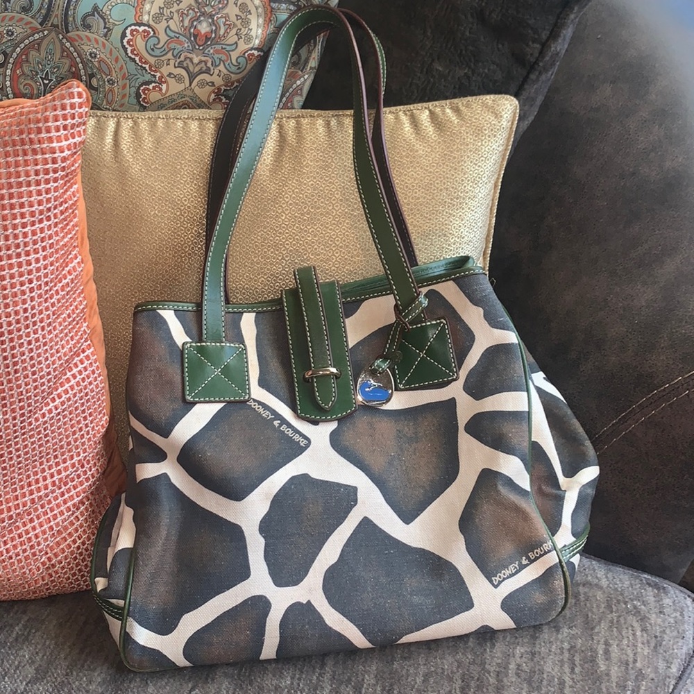 Dooney and Bourke cow print purse! See all pics! Measurements 12 × 10 × 6